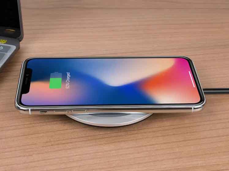 Charging phone on a wireless charger pad