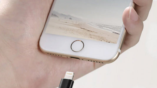 Plugging Lightning cable to iPhone charger port